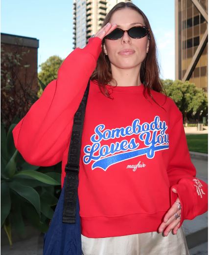 SOMEBODY LOVES YOU RED CREWNECK
